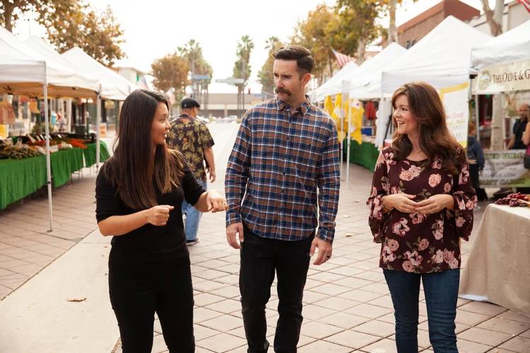 Adoptive parents navigating a conversation about their child's adoption in public
